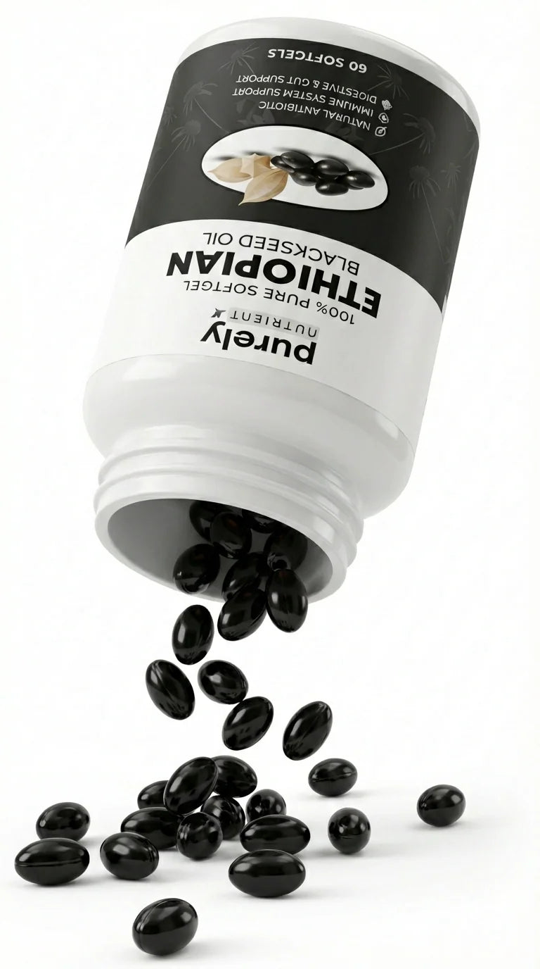 Frasco de aceite de semilla negra etíope con las cápsulas cayendo